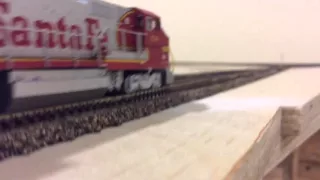 ATSF freight train struggles up the hill.