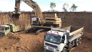 Caterpillar 365C Excavators Loading Trucks With Three Passes