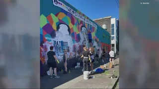 Portland neighbors helps repair defaced mural of George Floyd, Breonna Taylor and Ahmaud Arbery