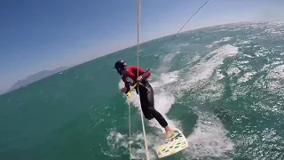 Capetown dolphins playing with kitesurfer, awesome!