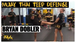 Ajarn Bryan Dobler (Double Dose Muay Thai) – Multiple Teep Defense Options in 4 Minutes