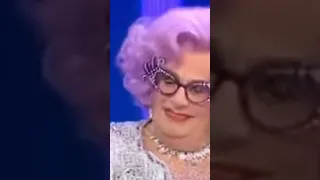 Dame Edna kicks the spin dryer into the fast cycle