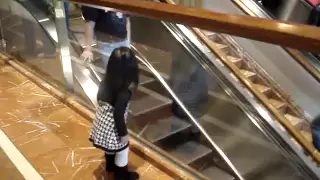 Chloe saying "bye" at the Copley Place Mall