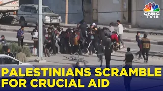 Israel-Hamas War | Trucks Bring Aid For Palestinians Via The Rafah Border In Gaza | IN18V |CNBC TV18