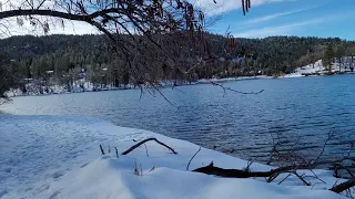 Nature hike at snow covered Lake Gregory in the San Bernardino Mountains - California USA