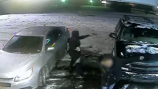 Surveillance footage of carjacking in Detroit