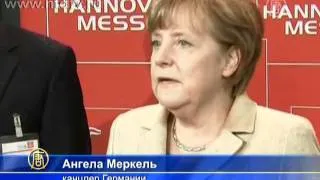 Меркель и Фийон посетили промышленную выставку