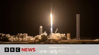 SpaceX rocket blasts US-Russian crew towards space station  | BBC News