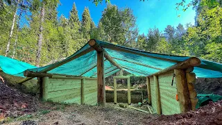 BUILDING a COZY dugout in a SECRET forest! We make beautiful and smooth walls in the wild! Pt.2