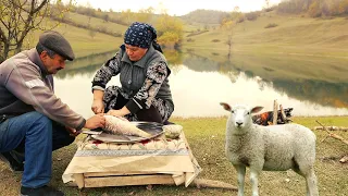 Cooking Carp fish on a Campfire in Sadj with Vegetables