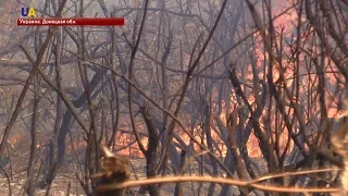 В районе оккупированной Горловки боевики поджигают целые поля