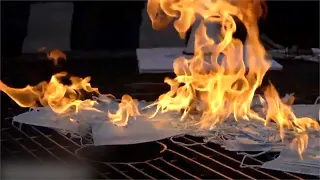 Anti-lockdown protesters burn masks in New York City