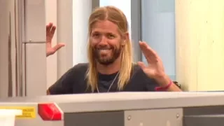 Foo Fighters Drummer Taylor Hawkins Handles Enhanced Pat-Down By LAX TSA Like A Champ