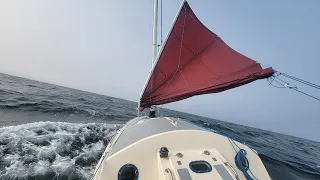 S2E104 Fully Reefed Junk Rig Sailboat on the Open Ocean