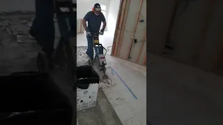 Busting up stubborn OLD tile flooring with large jack hammer chisel! how 2 home remodeling