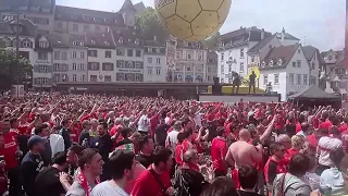 Liverpool fans sing 'Three Little Birds' in Barfusser platz, Basel, Switzerland
