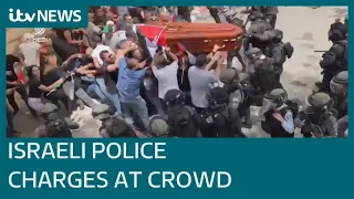 Israeli police beat mourners at Al Jazeera journalist Shireen Abu Akleh's funeral | ITV News