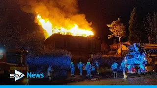 Fire tears through house as crews tackle overnight blaze