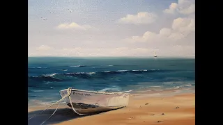 painting a boat on a beach