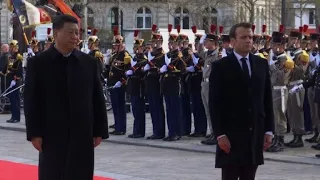 Ahead of talks, Macron and Xi pay tribute at Arc de Triomphe