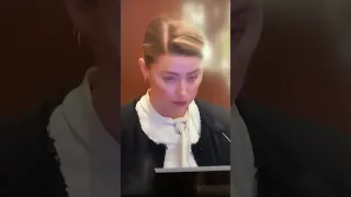 Caught! Amber Heard is seen on Camera doing cocaine while on the stand at her trial. May 5 2022
