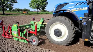 New Holland T 7.210 mit Baselier Frontfräse.