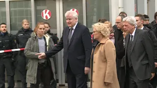 German Interior minister Horst Seehofer visits crime scene in Hanau | AFP