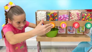 Sofia and Max clean up their toys in the room and help Dad