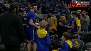 Klay Thompson signs and autographs everyone's shoes and collectibles after his shootaround