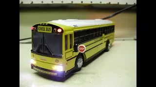 Custom 1:54 scale Thomas Saft Liner HDX school bus diecast model with working lights