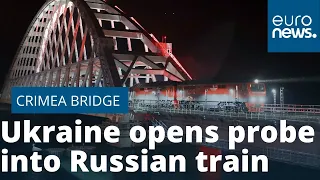 Ukraine opens probe into Russian train on new bridge to Crimea