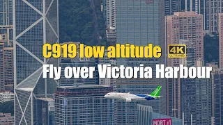 China's C919 aircraft fly over low altitude over Victoria Harbour