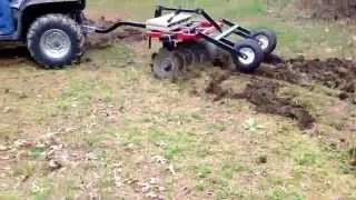 ATV putting in food plots with a Howse ATV disc harrow.