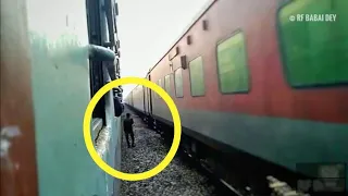 Stupid Man Risking His Life By Standing Beside A Running Train At New Domohani