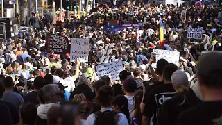 More than 250 arrested as anti-lockdown protesters clash with police in Australia