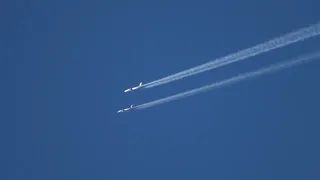 Boeing 777 - American and Emirates, passing overhead together Cocagne, New Brunswick - Dec. 5, 2022