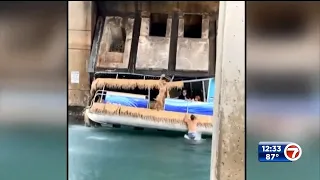 Passengers able to escape before rising drawbridge partially crushes boat in Jupiter