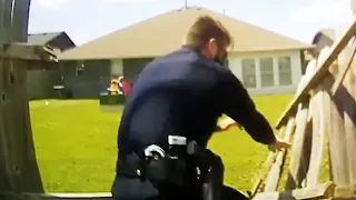 Cop Breaks Through Fence Chasing After Suspect