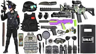Unpacked special police weapon toy set, M1911 toy pistol, M416, bomb dagger, combat helmet