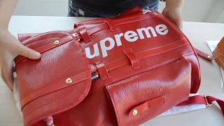 SUPREME x LOUIS VUITTON PICKUPS IN HAND IN DETAILS FROM COCOGOD.CLUB