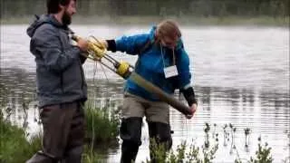 Vanessa Stretch explains how a gravity core works for sampling sediment - Burning Issues Field Tour