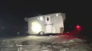 Pulling the Freeze Castle Luxury Ice Fishing House off the ice!!!