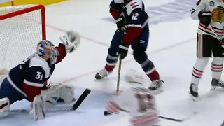 Philipp Grubauer raises the glove for incredible save on DeBrincat