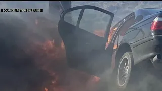 Good Samaritans Battle Flames To Rescue Men From Burning Car