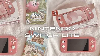 unboxing my nintendo switch lite with animal crossing & mario kart 8 deluxe