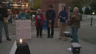 About a dozen protesters hold vigil against execution