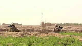 Marines from patrol base Boldak in fox hole - War in Afghanistan archival HD footage