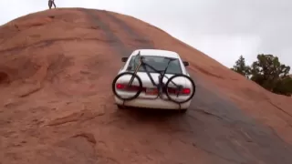 Moab rock crawling in a Crown Victoria - baby lions back slick rock jeep climb