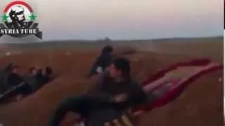 Syrian Army artillery scores a direct hit on FSA rebels.