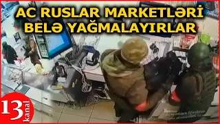 Rus əsgərləri Kiyevdəki supermarketləri TALAN EDİRLƏR